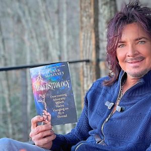 Frank Holding Book